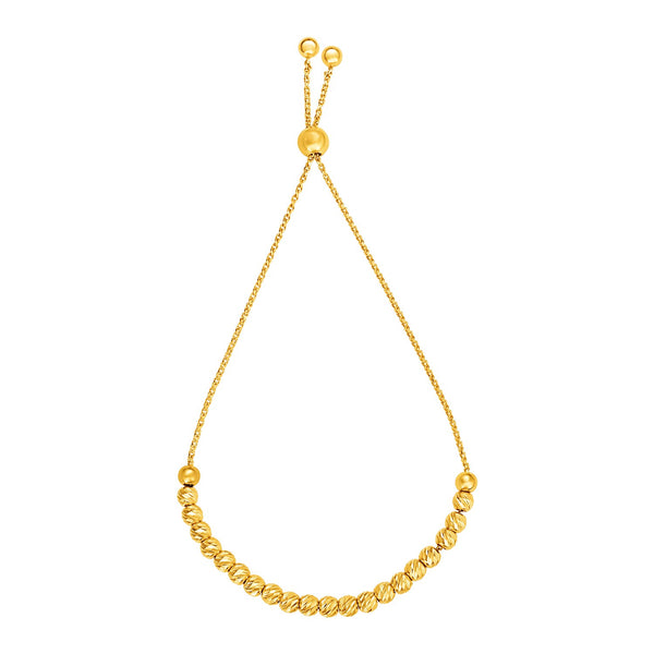 Adjustable Bracelet with Textured Beads in 14k Yellow Gold