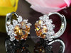 Load image into Gallery viewer, Yellow Flower CZ Cubic Zirconia Huggie Earrings XE407